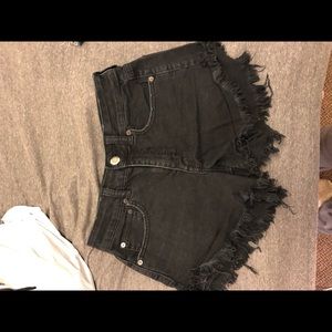 Black cutoff shorts